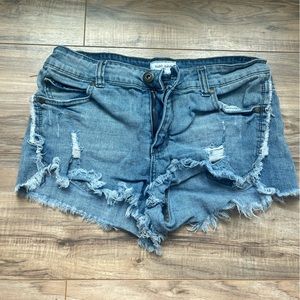 Low waisted Jean shorts with holes